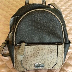 Dark brown and tan Guess backpack